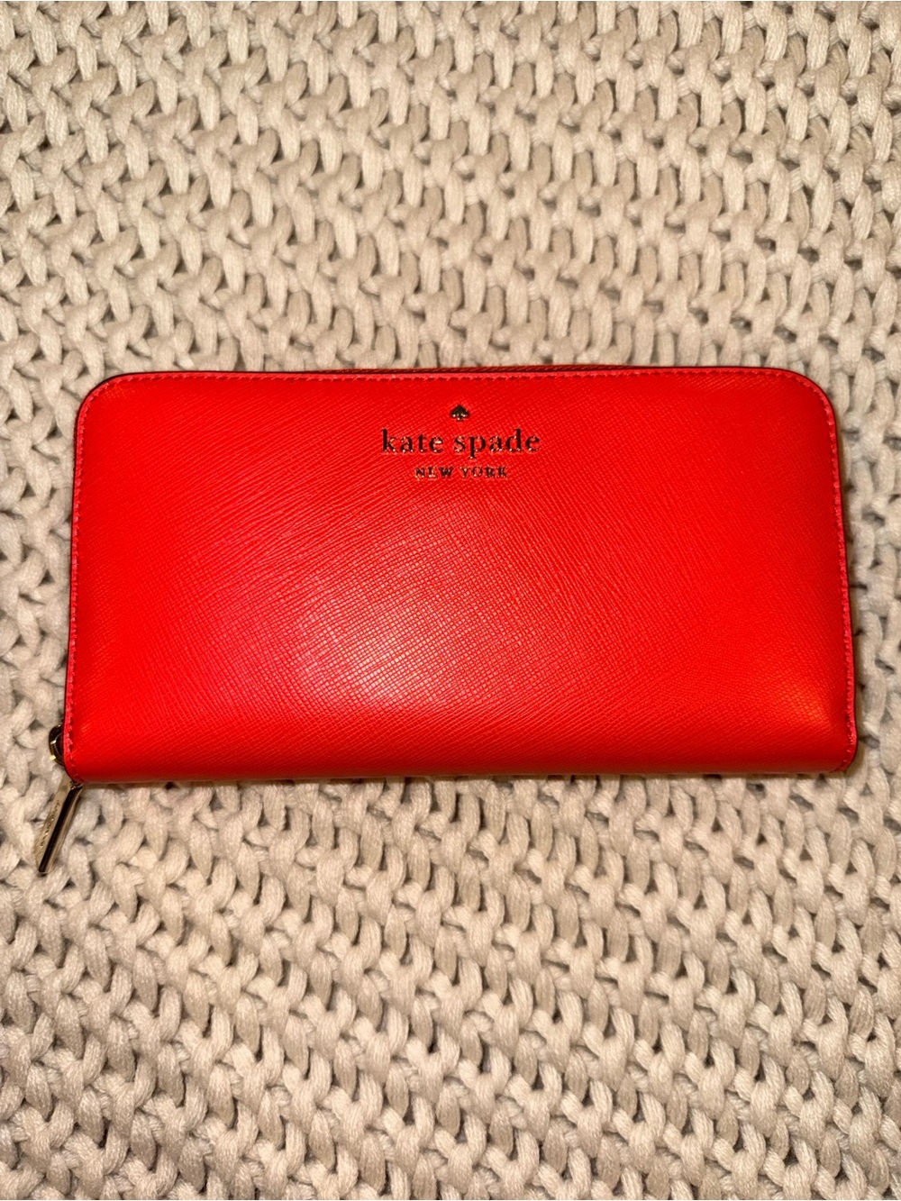 kate spade bright orange leather wallet with gold logo